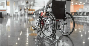 image shows wheelchair user in an airport